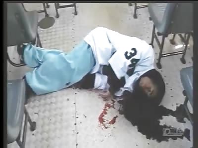 A YOUNG MAN DYING WITHIN A BUS AFTER BEING SHOT