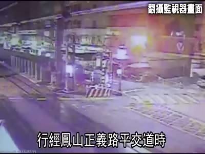 BIKER IS HIT BY TRAIN