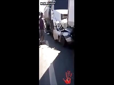 MAN DIED WHEN CAR WAS CRUSHED BETWEEN TWO TRUCKS