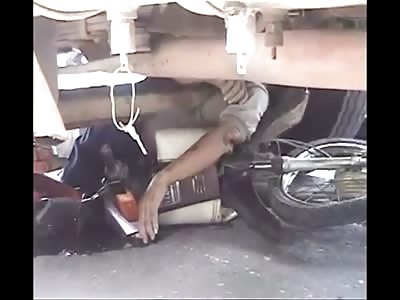 OLD BIKER DIES UNDER TRUCK