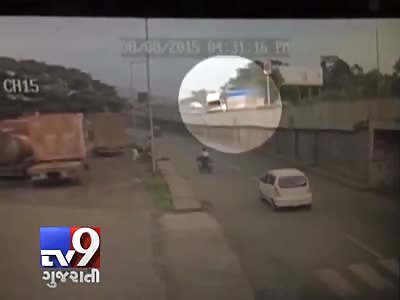 TYRE BURST CAUSES TRUCK TO FALL OFF BRIDGE