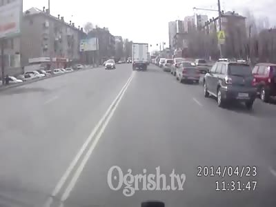 Biker hit by Truck