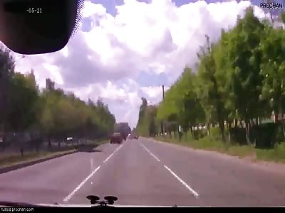 Biker takes a red light and t-bones a car with high speed