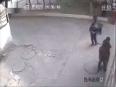 Explosion caused by kid throwing fire in manhole 