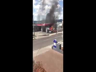 Public Rescue Car Occupants Following Crash  Fire at Gas Station