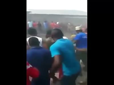 Naked woman stoned to Death. 