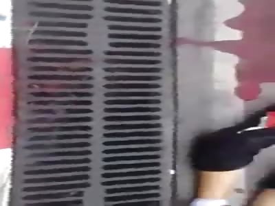 Young girl is dying on zebra crossing.