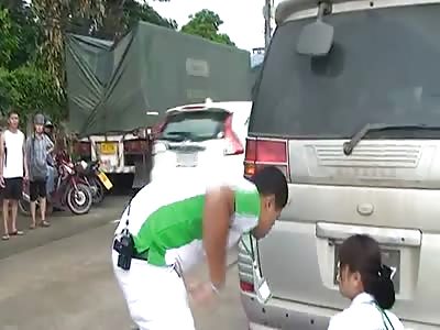 biker agonizes under car after accident